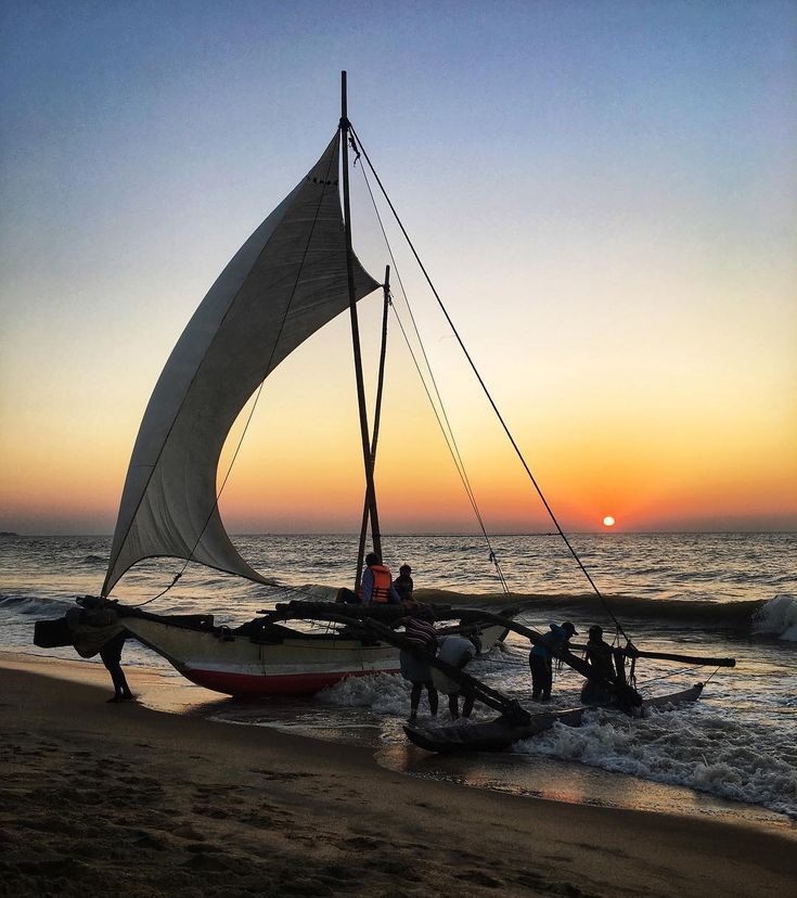 Sailors returning to the beach at Negombo, our…